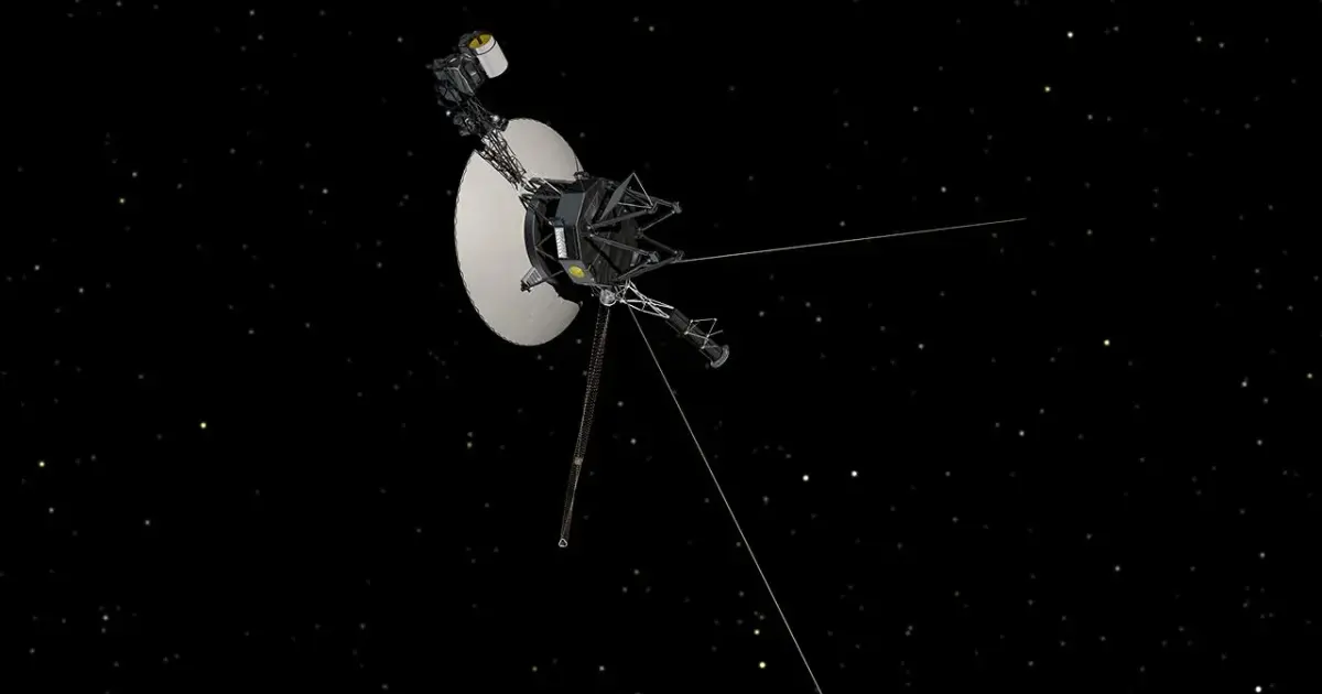 Καλλιτεχνική απεικόνιση του σκάφους Voyager της NASA με τη μεγάλη λευκή κεραία και τους μακριούς βραχίονες οργάνων στο σκοτάδι του διαστήματος